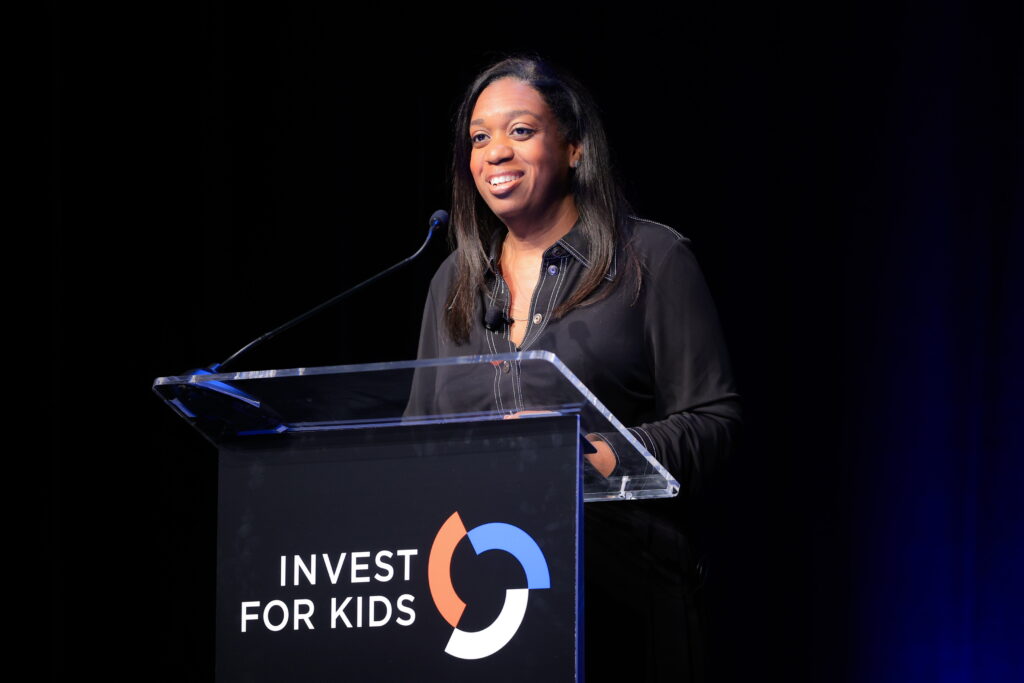 Sherrese Clarke Soares speaking at Invest For Kids